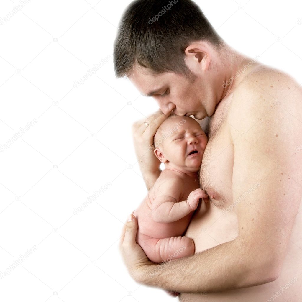 Newborn baby on the fathers hands