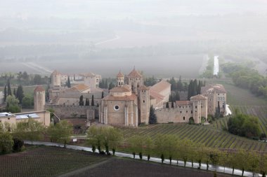 Monastery of Santa Maria de Poblet, located in the region Conca de Barbera. Catalonia, Spain clipart