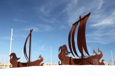 Sail ship monuments in Puerto de Mazarron, Spain clipart