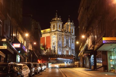 Santo Ildefonso Church illuminated at night, Oporto Portugal clipart