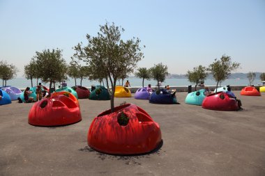 Colorful chairs on the promenade in Lisbon, Portugal. clipart