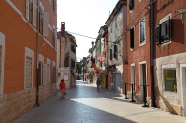 Street in the old town Umag, Croatia clipart