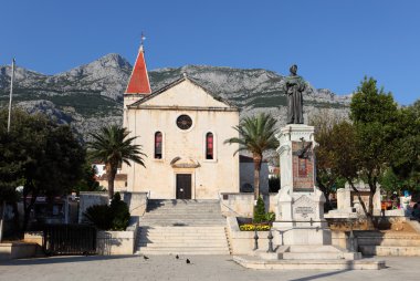 Statue of the Fransican monk Andrija Kacic Miosic in Kacicev trg, Makarska clipart