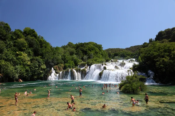 Bathing in front of the waterfall in Krka National Park — Stock Photo, Image