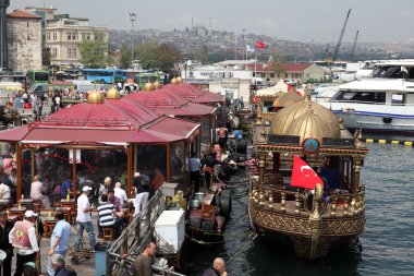 Balik Ekmek (fish bread sandwich) boats at the Galata Bridge in Istanbul clipart