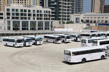 Bus parking in Dubai clipart