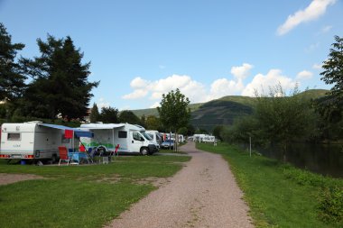 Camp site at the Mosel river, Germany. clipart