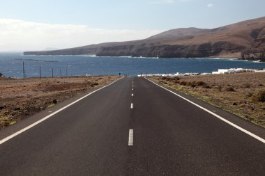 Road to Playa Quemada on Canary Island Lanzarote, Spain clipart