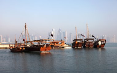 Traditional arabic dhows in Doha, Qatar clipart