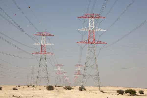 stock image High voltage transmission towers in the desert of Qatar