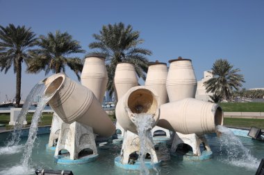 Water jar fountain at the corniche of Doha, Qatar clipart