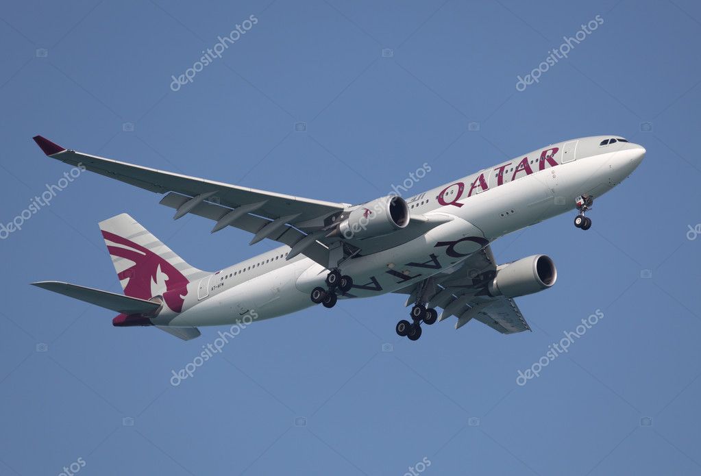 Qatar Airways airplane in the air, Doha Qatar.