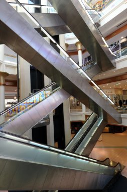 Escalators in the Wafi mall in Dubai clipart