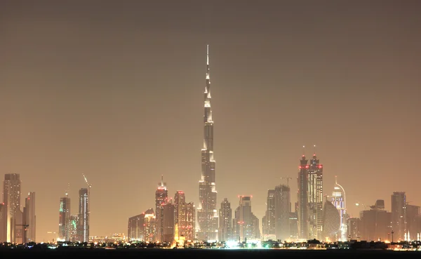 Dubai skyline at night — Stock Photo, Image