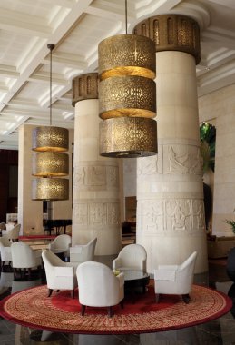 Interior of the Egyptian themed Raffles hotel in Dubai clipart