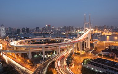 Nanpu Bridge at night. Shanghai, China clipart