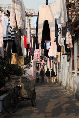 Narrow street in the old town of Shanghai, China clipart