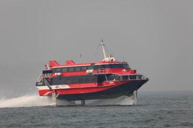 High speed hydrofoil ferry boat between Hong Kong and Macau clipart