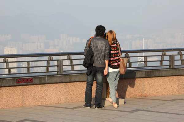 stock image Couple enjoying the view over Hong Kong from Victoria Peak