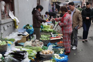 Vegetables market in Shanghai, China clipart