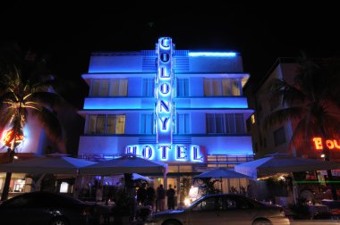 The Art Deco Colony Hotel illuminated at night. Miami South Beach, Florida clipart