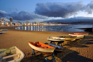 Fishing boats on the beach. Las Palmas de Gran Canaria, Spain clipart