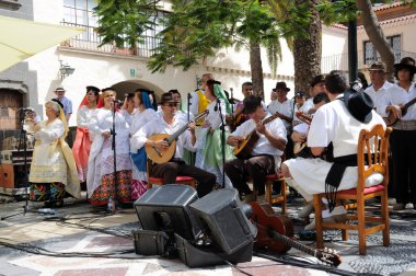 Traditional singers in Pueblo Canario, Doramas Park, Las Palmas de Gran Canaria clipart