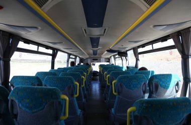 Inside of an almost empty bus clipart