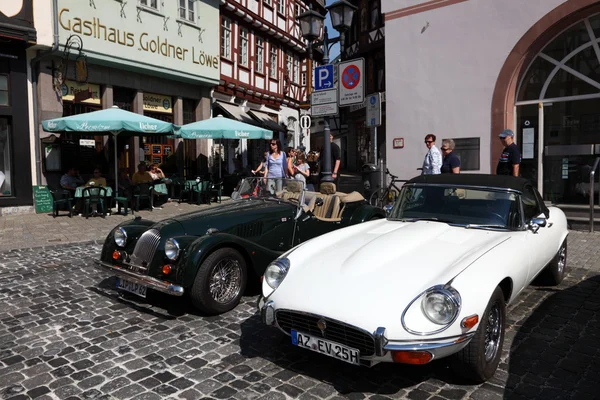 Vintage cars parked in the old town of Limburg, Hesse Germany — стоковое фото