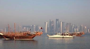 Traditional arabic dhows in Doha, Qatar clipart