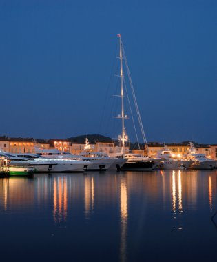 Luxury yachts in the harbor of Saint Tropez, France clipart