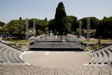 Open air theater build in the Roman Amphitheater, Frejus, France clipart