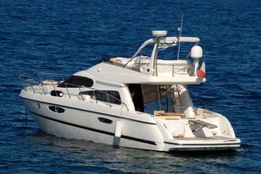 Small luxury Motor Yacht in the Mediterranean Sea clipart