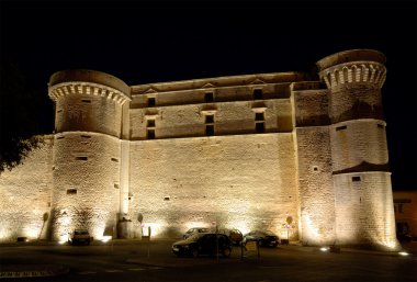 The castle in Gordes, southern France at night clipart