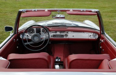 Red interior of a classic Mercedes cabriolet clipart