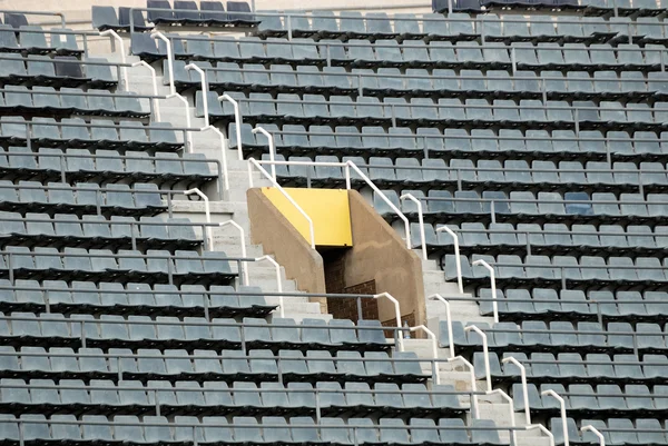 Grey empty seats in a stadium — Stock Photo, Image