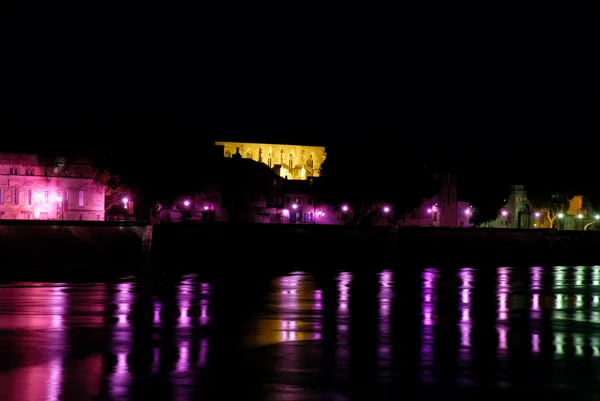 stock image Street light reflecting in river Rhone, Arles, France
