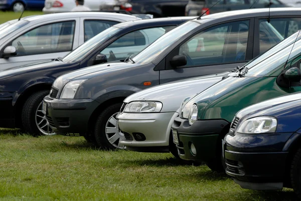 Cars parked on the meadow — Stock Photo, Image