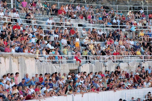 stock image Spectators of a bullfight in the Roman arena in Arles, France