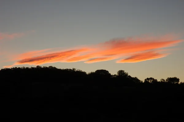 Orange moln efter solnedgången — Stockfoto