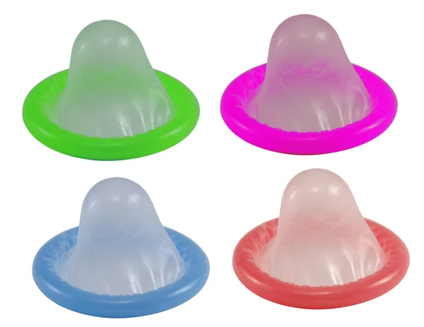 Vier kleurrijke condooms — Stockfoto