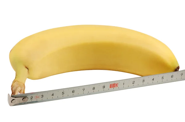 Banan i jej rozmiar z pomiaru ruletka — Zdjęcie stockowe