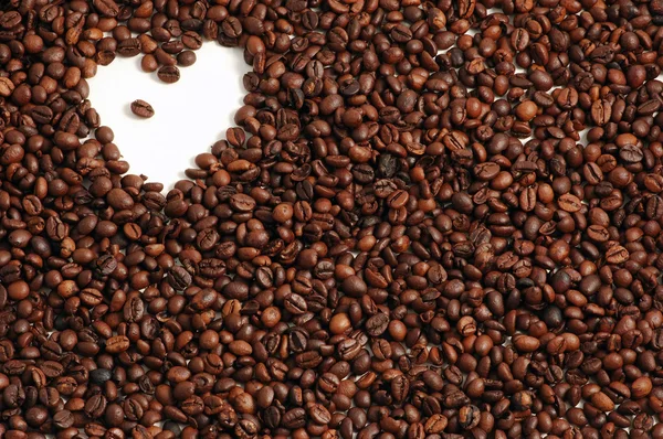 Kawa tło z serca — Zdjęcie stockowe