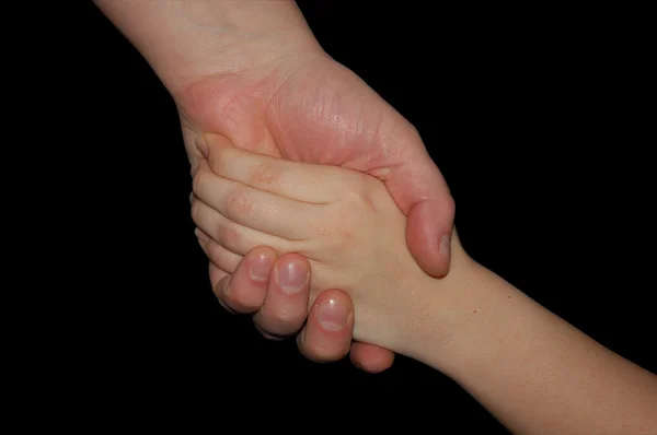 Handshake izolovaných na černém — Stock fotografie