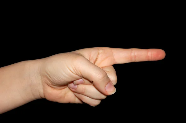 Finger pointig the way on black background — Stock fotografie