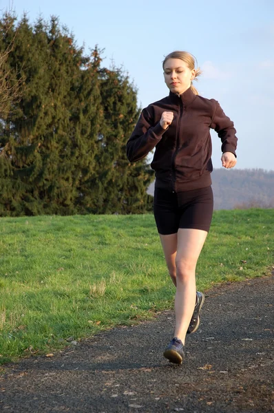 Giovane donna Jogging — Foto Stock