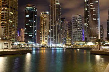 Jumeirah Lakes Towers at night. Dubai clipart