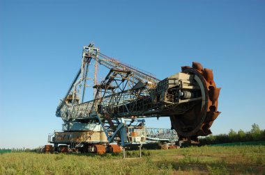 Abandoned daylight mine excavator for brown coal clipart