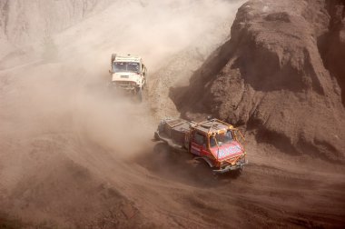 Mercedes Benz Unimog rally truck at offroad competition clipart