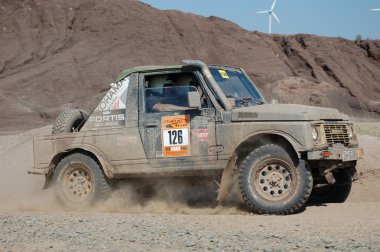 Suzuki SJ jeep at offroad rally competition clipart